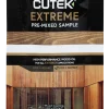 Close-up of Cutek Extreme wood oil sachet with 'Pre-Mixed Sample' label against a wood-grain background